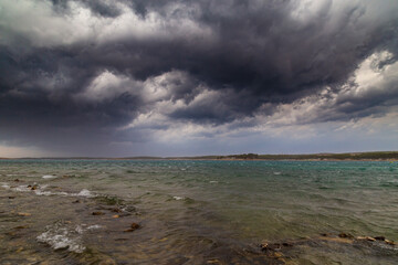 Dramatic storm clouds and rain over the Adriatic Sea in summer