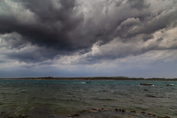 Dramatic storm clouds and rain over the Adriatic Sea in summer
