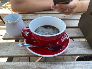 person with cup of coffee