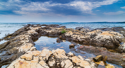 Beautiful rock formations along the Adriatic Sea coast in summer