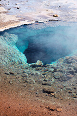 Crystal clear blue water in iceland, geothermal water pool, steam rising up, beautiful nature