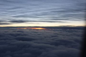 soft and beautiful clouds from above at sunrise, nature at it's best