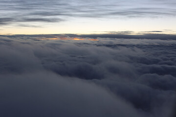 Obraz premium soft and beautiful clouds from above at sunrise, nature at it's best