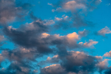 Naklejka na ściany i meble Clouds in front of blue sky