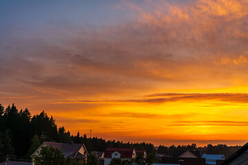 Obraz premium Orange-red sunset against the blue sky near Moscow, Russia