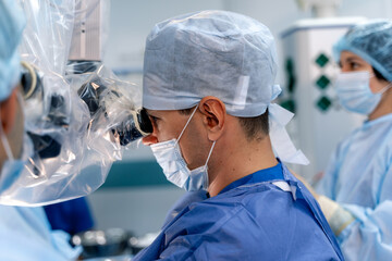Half side view on neurosurgery doctor. Portrait of neurosurgeon. Equipment and medical devices in...