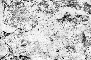 Texture of a concrete wall with cracks and scratches which can be used as a background