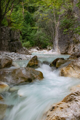 Fototapeta na wymiar Vertical photograph of long exposure in Pozar river northen Greece