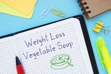 Weight Loss concept about Weight Loss Vegetable Soup with inscription on the sheet.