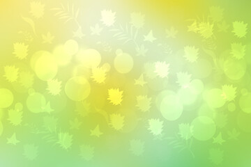 Abstract bright landscape texture with natural light green bokeh lights and bright yellow sunny light with leaves. Autumn or summer background with copy space.