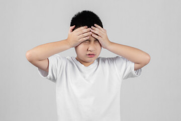 Asian boys studio shot portrait on gray background