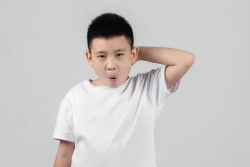 Asian boys studio shot portrait on gray background