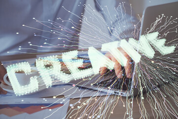 Start up drawings with businessman working on computer on background. Teamwork concept. Double...