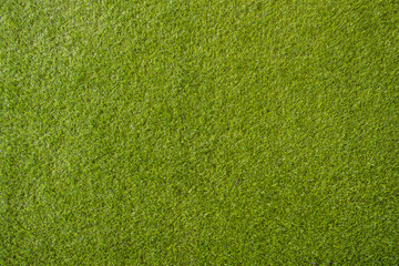 artificial grass. green field background.look freshness decorated wallpaper