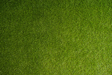 artificial grass. green field background.look freshness decorated wallpaper