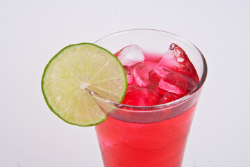 Red water mixed with soda and lemon.