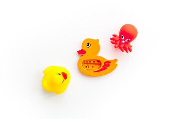 The concept of children’s bath toys. White background top view copyspace
