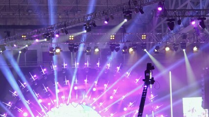 Crane jib camera moves in front of stage lights
