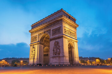 Fototapeta na wymiar Paris France city skyline night at Arc de Triomphe and Champs Elysees empty nobody