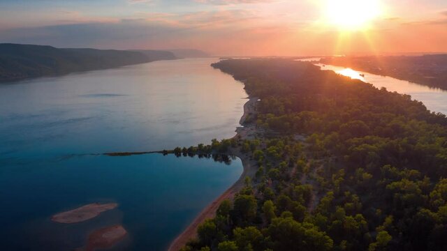 Timelapse of the Volga river. Aerial hyperlapse of the river of Volga at sunset. Area of Zhiguli Mountains and Samara city. Russia