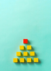 Business material, pyramid-shaped block. Society, organization, strategy, top-down, plans, ideas,...
