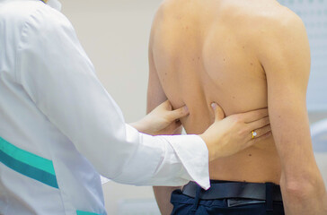 Palpation and percussion of the patient