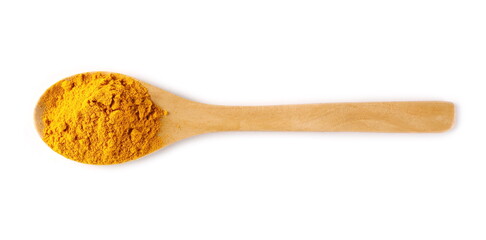 Turmeric (Curcuma) powder pile in wooden spoon isolated on white background, top view