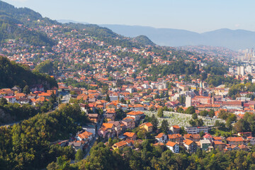 Naklejka na ściany i meble Panoramic view of the city of Sarajevo from the top of the hill. Bosnia and Herzegovina