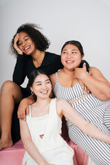 Portrait of diversity with african and thai women on white background.