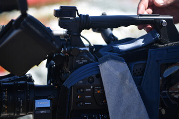 Fototapeta premium camera, video, lens, film, isolated, digital, television, equipment, professional, movie, camcorder, technology, media, photography, white, tripod, black, cinema, studio, microphone, focus, filming, p