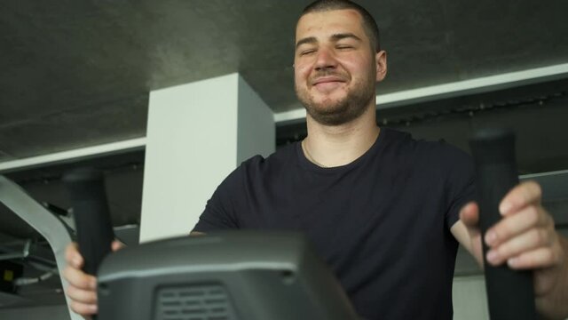 Professional athlete does cadre training on orbitrek. Preparation for competitions