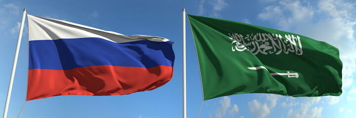 Flying flags of Russian Federation and Saudi Arabia on sky background, 3d rendering