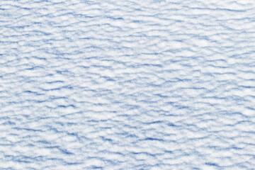 Snow texture in sunny weather, winter background
