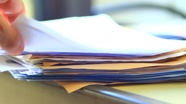 Papers, stack of papers, office.