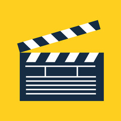 Obraz premium Movie clapper isolated on a yellow background