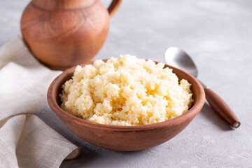 Couscous in a bowl on the table