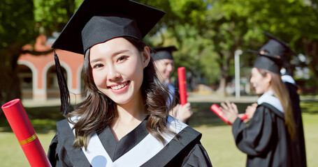 happy female graduate student