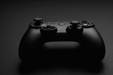 Black video game controller. Gamepad © spaxiax