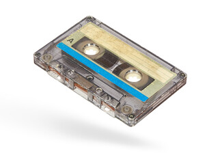 Old used audio cassette isolated on white background