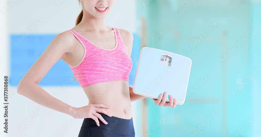 Poster woman hold weight scale