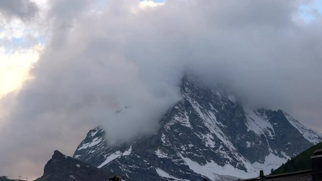 Time-lapse of the Matterhorn mountain summit in the clouds in Zermatt Switzerland