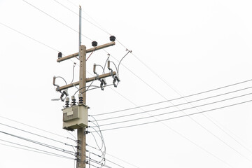 Electric transformer with isolated background. Electric pole with copy space. AC high voltage power...