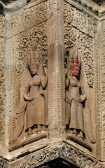Bas-relief of beautiful ancient female angels (apsaras) at Angkor Wat, Siem Reap, Cambodia