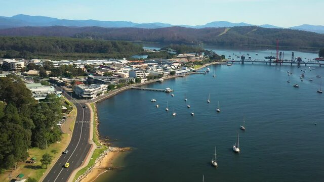 Aerial drone view of Batemans Bay on the New South Wales South Coast, Australia, looking toward Clyde River and Clyde River Bridge, on a sunny day 