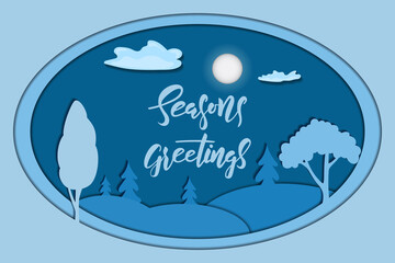 Paper cut card with Seasons Greetings calligraphy text