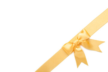 Beautiful gold ribbon and bow isolated on white background.