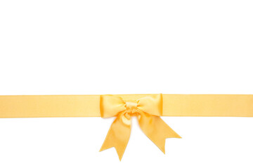 Beautiful gold ribbon and bow isolated on white background.