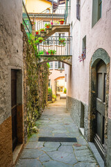 Gandria village alley vertical view with colorful houses in Gandria Lugano Switzerland