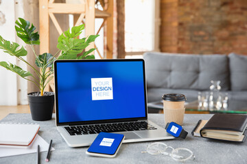Devices or gadgets with copyspace for ad - mockup, digital concept. Office or co-working location with highly digital workplace with laptop, smartphone or tablet. Online work, shopping, service