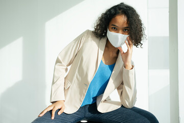 Fashion portrait of african business woman in casual jacket.